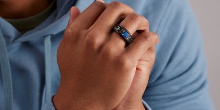 Close up of a black banner style high school class ring.