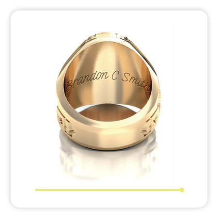 A close up image of the inside of a ring showing custom engravings.