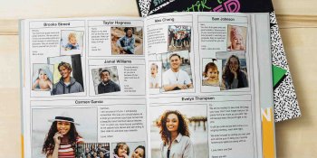 A yearbook opened to the student recognition ads page